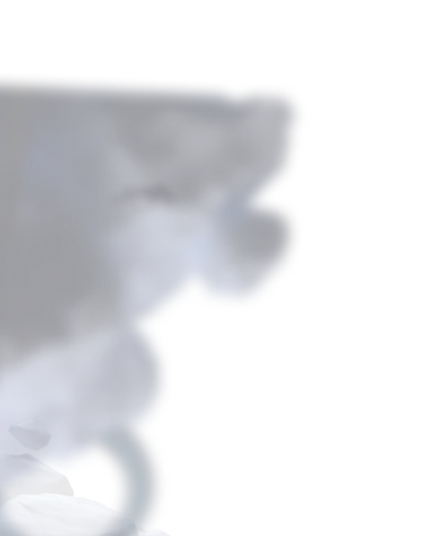 Smoke rising from burning coals or ashes on a dark background.